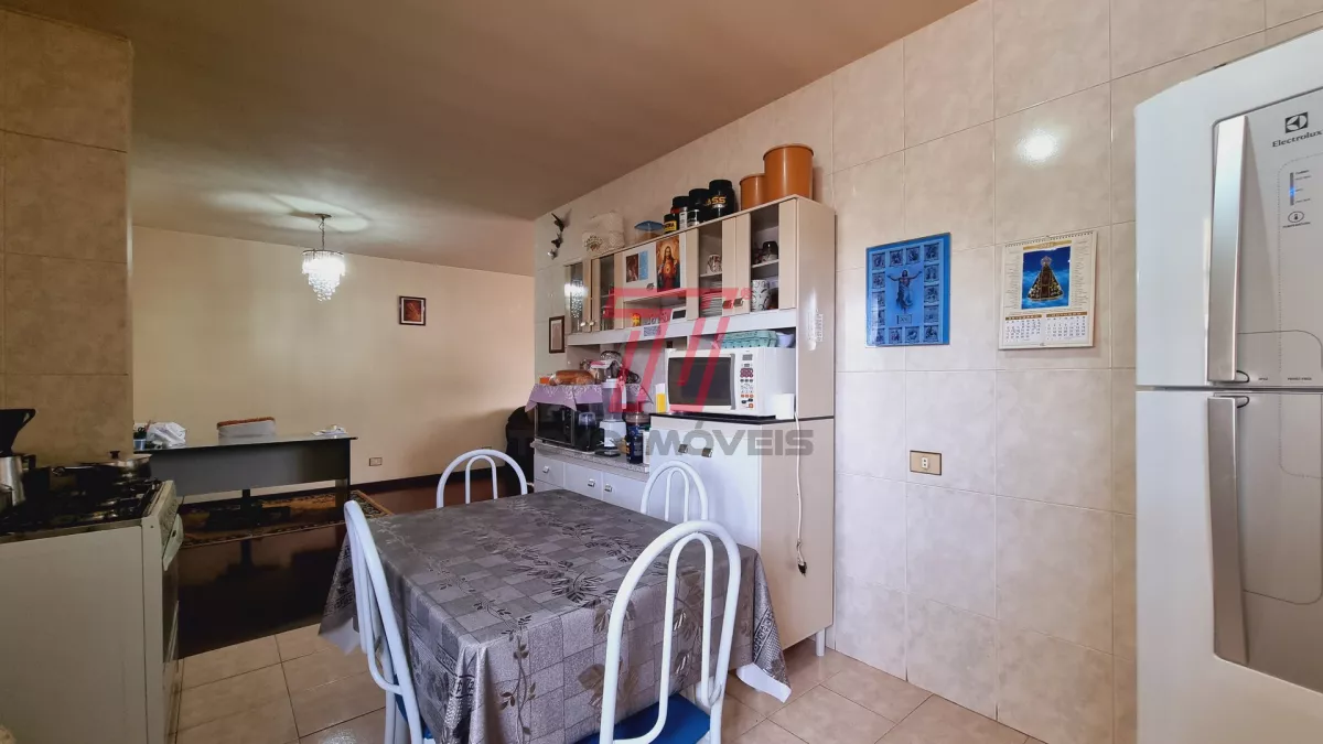 Sobrado residencial e comercial à venda, com 318,90 m² por R$ 900.000,00 - Xaxim - Curitiba/PR