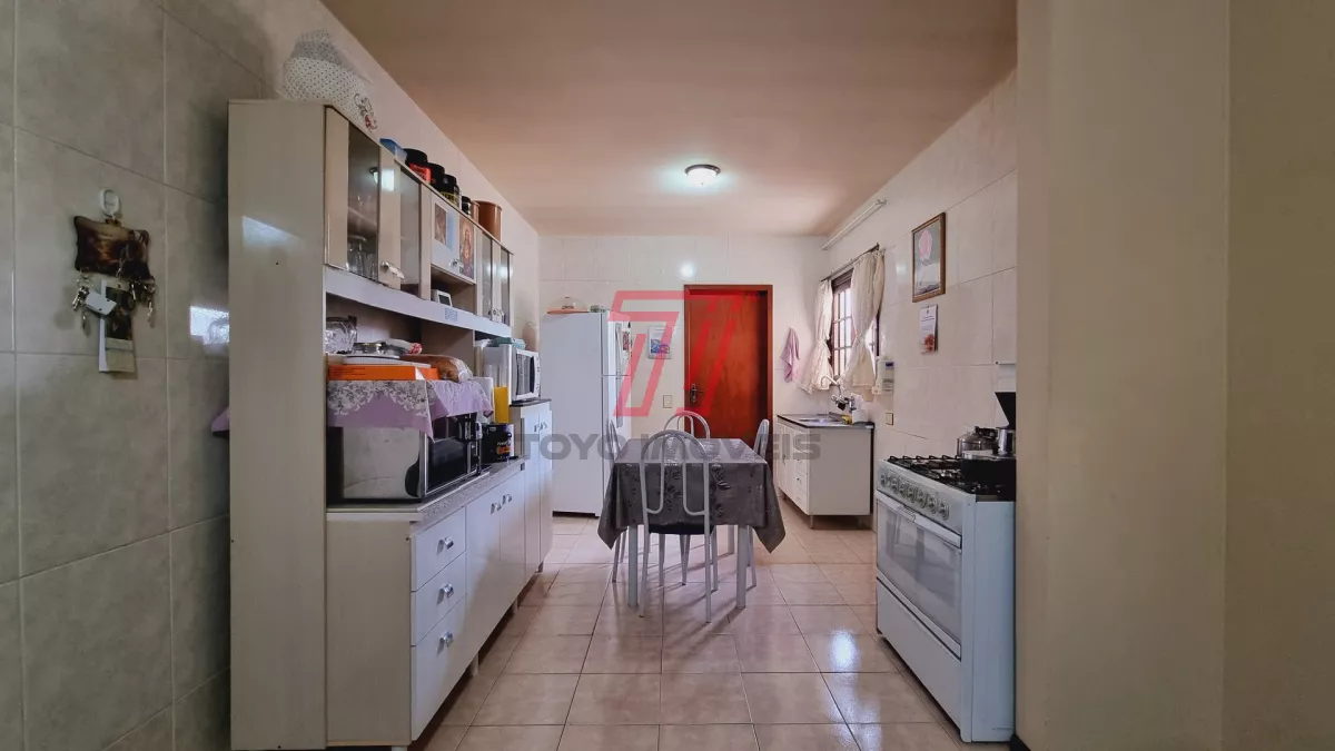 Sobrado residencial e comercial à venda, com 318,90 m² por R$ 900.000,00 - Xaxim - Curitiba/PR