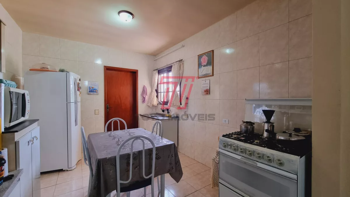 Sobrado residencial e comercial à venda, com 318,90 m² por R$ 900.000,00 - Xaxim - Curitiba/PR