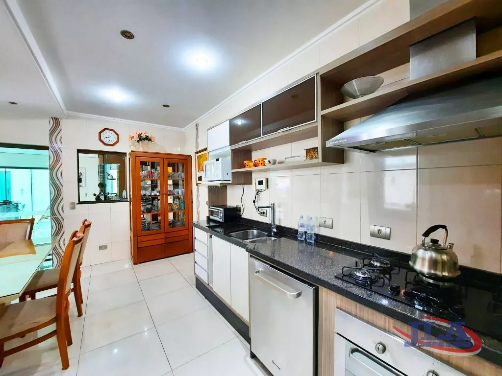 Sobrado com 3 dormitórios à venda, 295 m² por R$ 1.500.000,00 - Boa Vista - Curitiba/PR