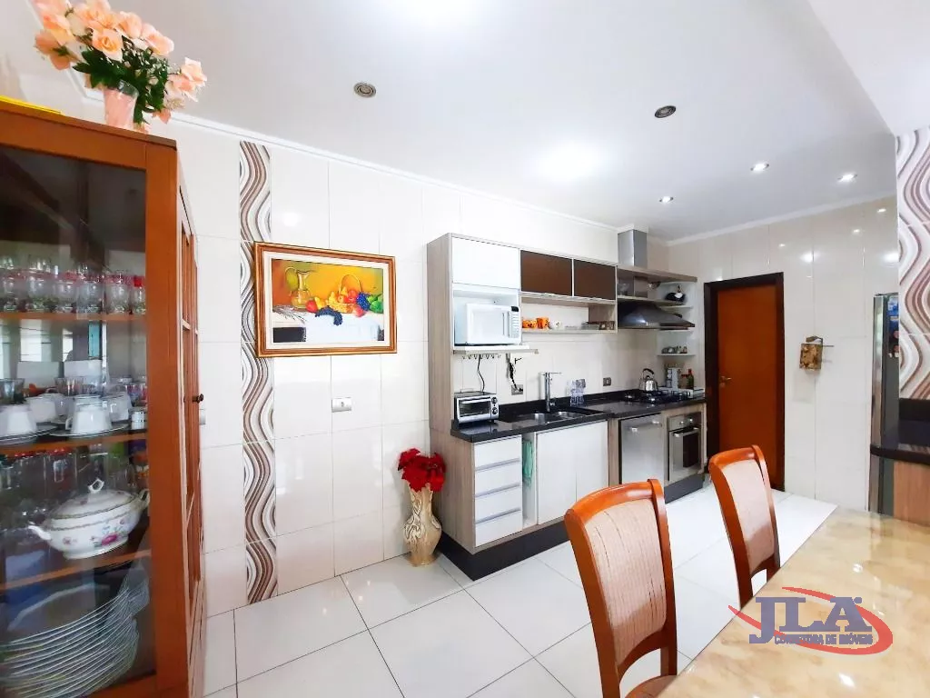 Sobrado com 3 dormitórios à venda, 295 m² por R$ 1.500.000,00 - Boa Vista - Curitiba/PR